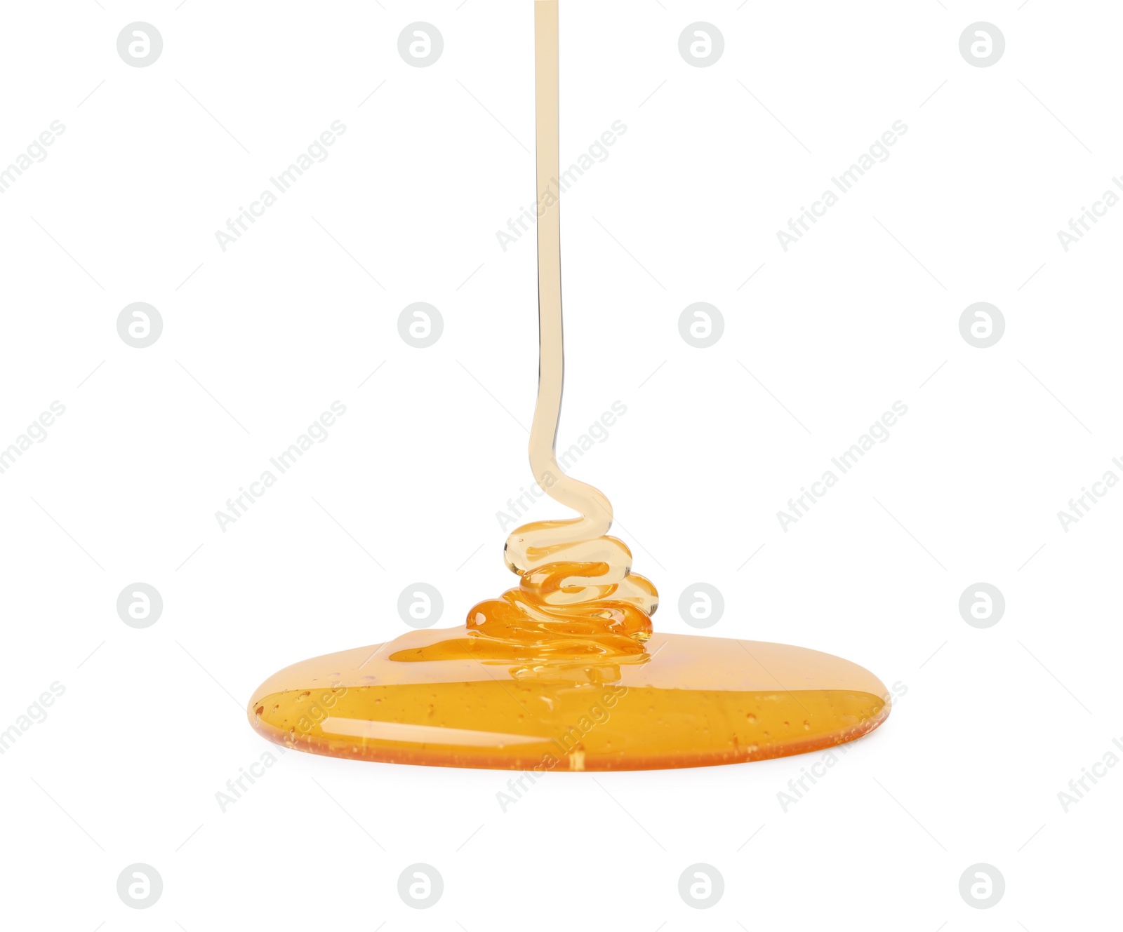 Photo of Pouring tasty natural honey isolated on white