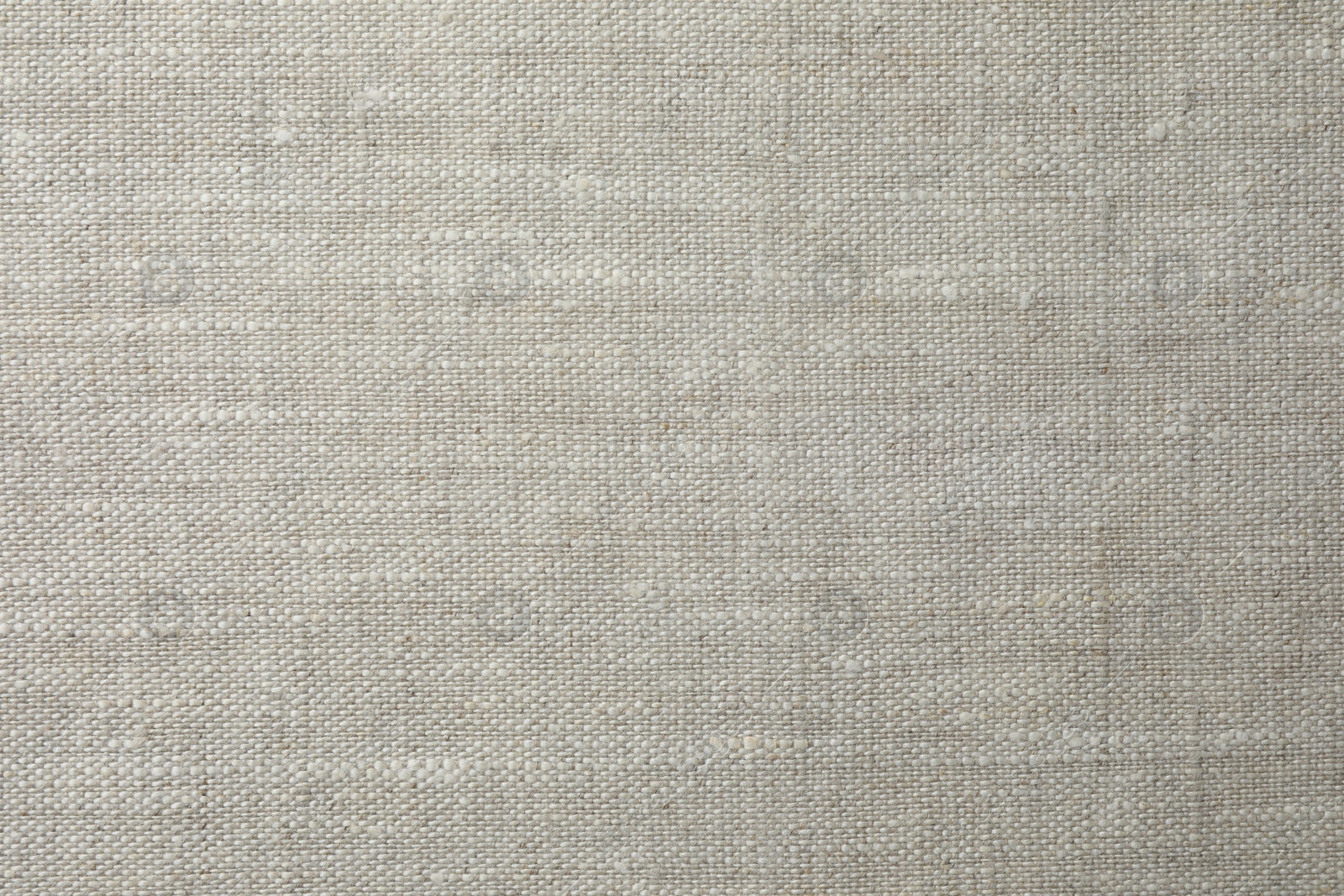 Photo of Texture of light grey fabric as background, top view