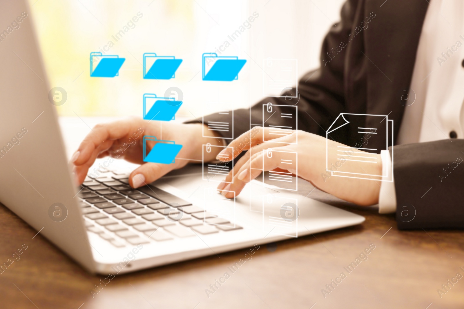 Image of Electronic document management. Woman working on laptop at table, closeup