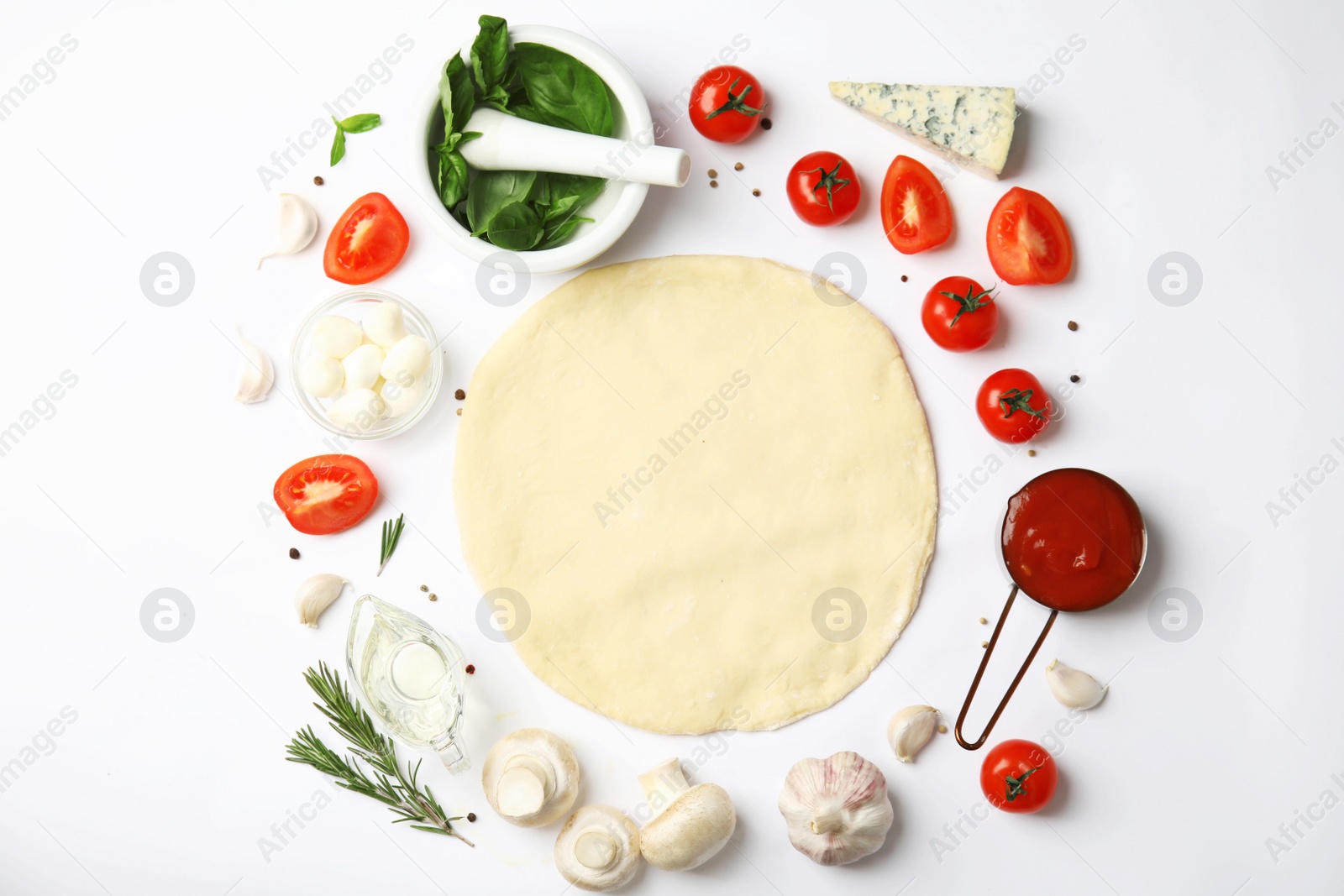 Photo of Flat lay composition with dough and fresh ingredients for pizza on white background