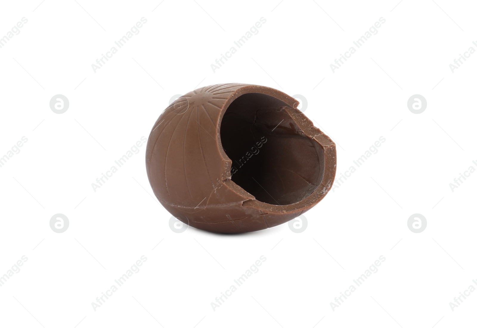 Photo of Broken milk chocolate egg on white background