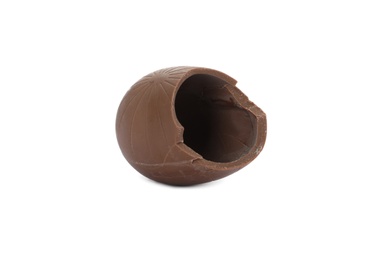 Photo of Broken milk chocolate egg on white background