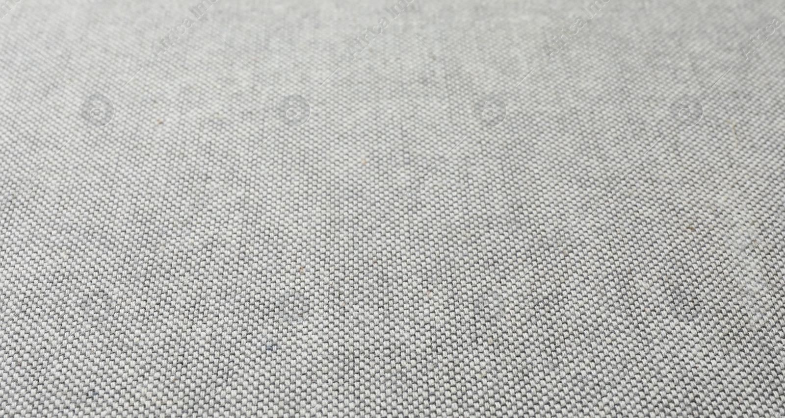 Photo of Texture of grey fabric as background, closeup