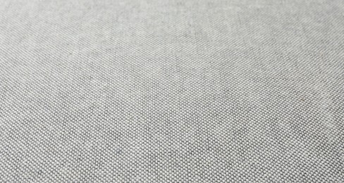Photo of Texture of grey fabric as background, closeup