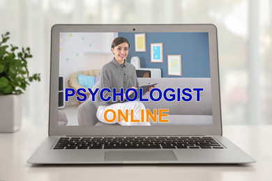 Image of Online consultation with psychologist via modern laptop at home