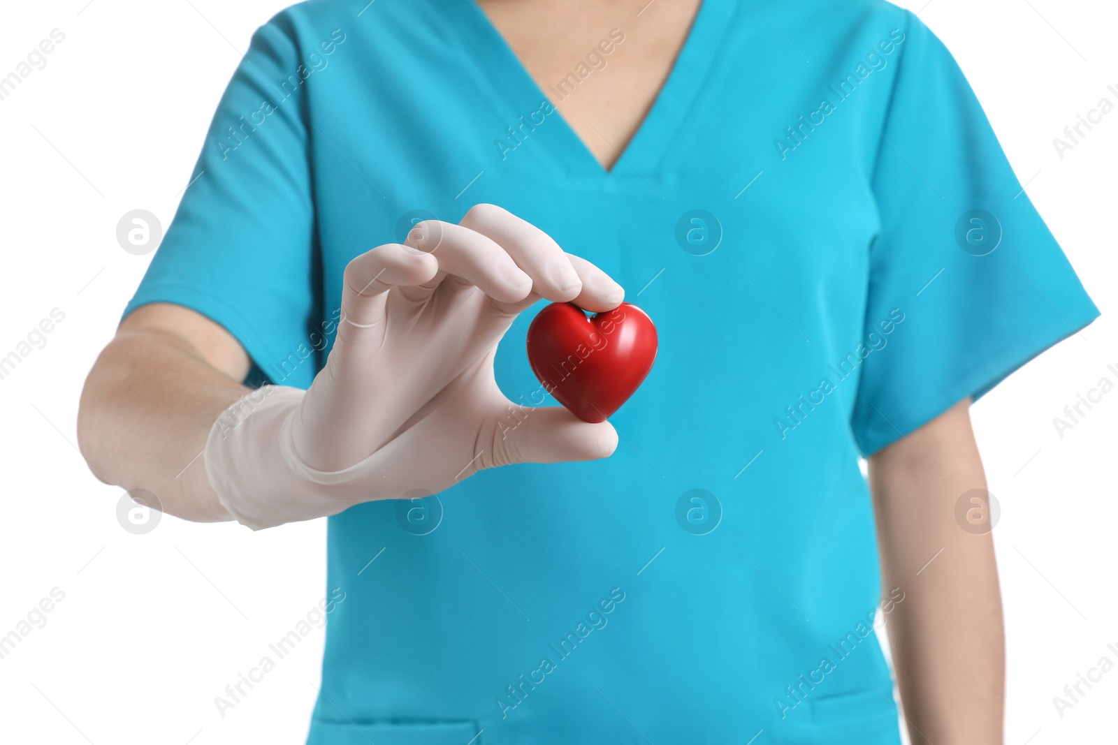 Photo of Doctor in medical glove holding red heart on white background, closeup