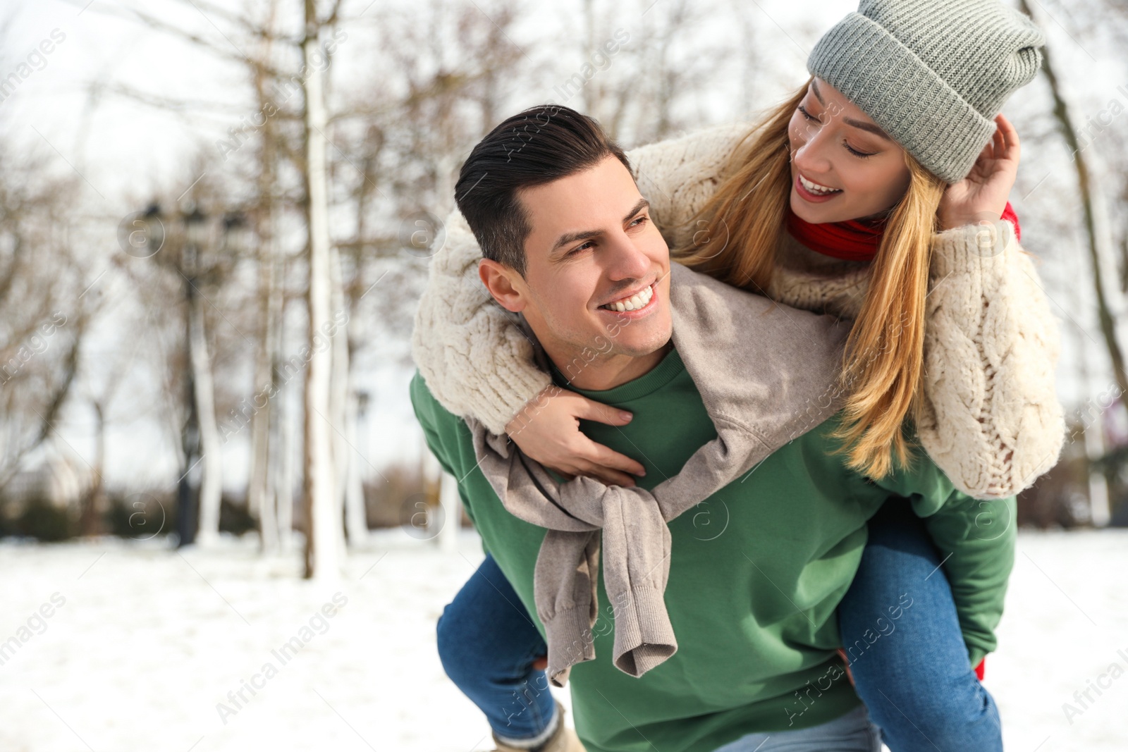 Photo of Beautiful happy couple outdoors on winter day