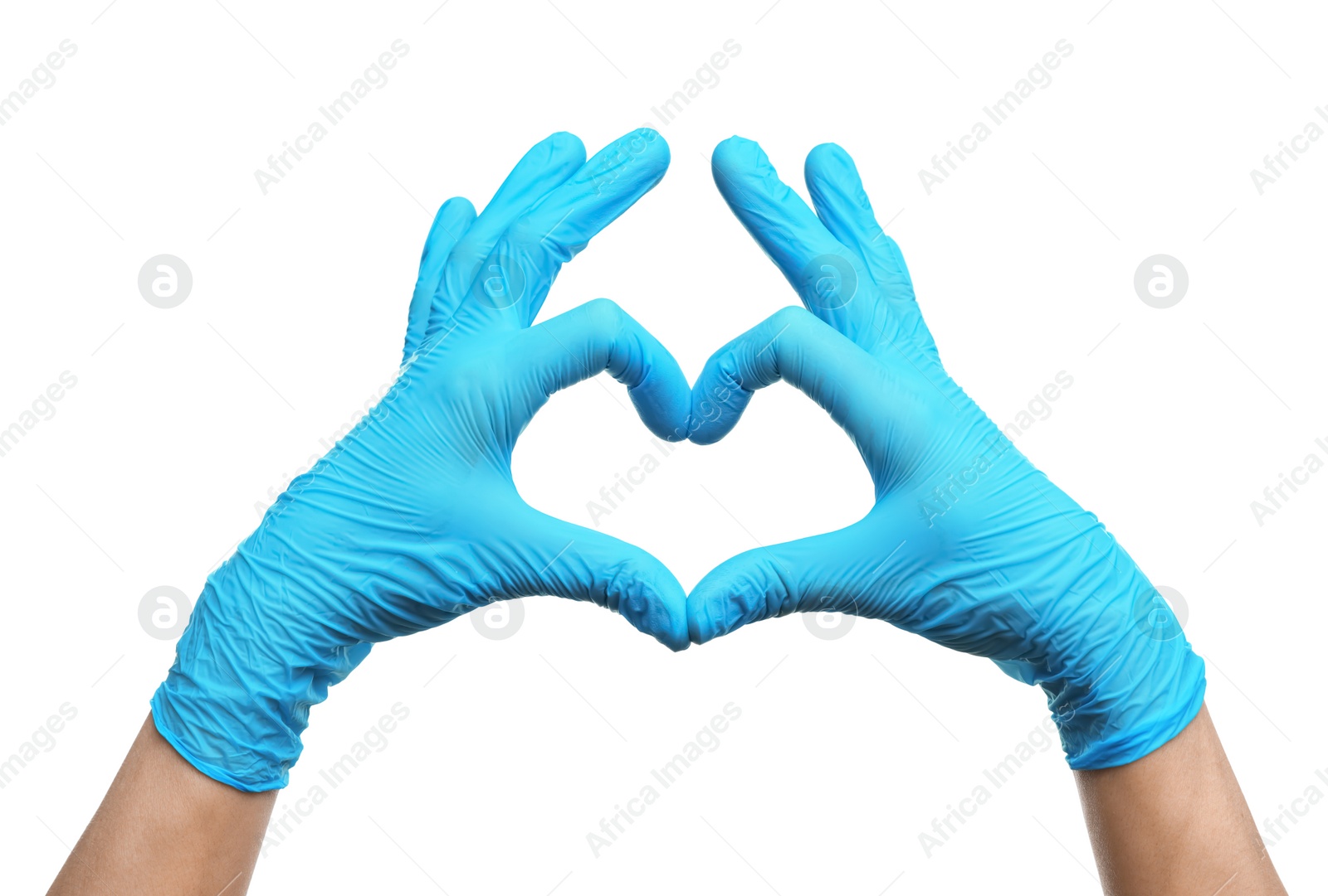 Photo of Doctor wearing light blue medical gloves making heart gesture on white background, closeup