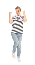 Young woman celebrating victory on white background