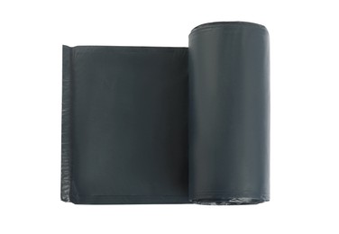 Photo of Roll of black garbage bags on white background, top view. Cleaning supplies