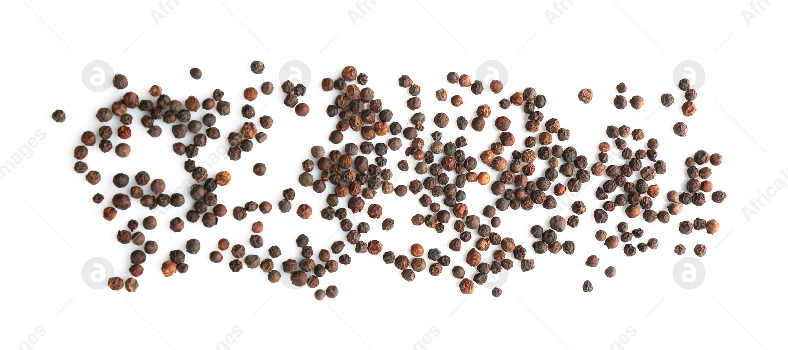 Photo of Black pepper grains on white background, top view. Natural spice