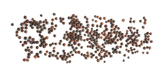 Black pepper grains on white background, top view. Natural spice