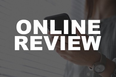 Image of Online review. Woman using mobile phone to leave feedback, closeup