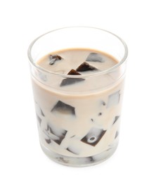 Photo of Glass of milk with grass jelly isolated on white