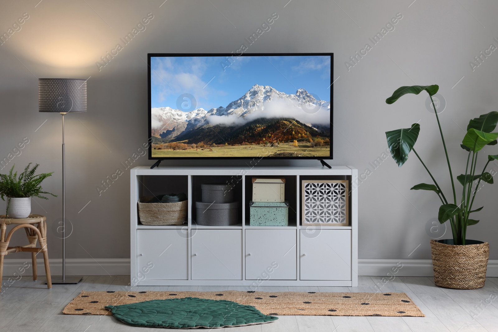 Image of Mountain landscape on TV screen in room