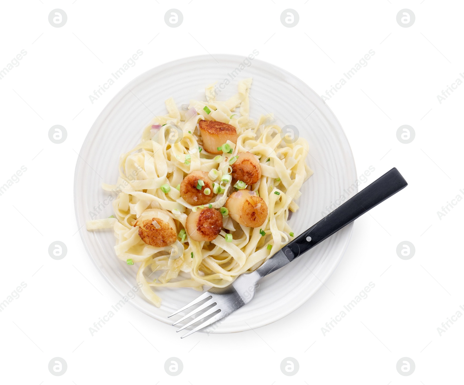Photo of Delicious scallop pasta with onion and fork isolated on white, top view