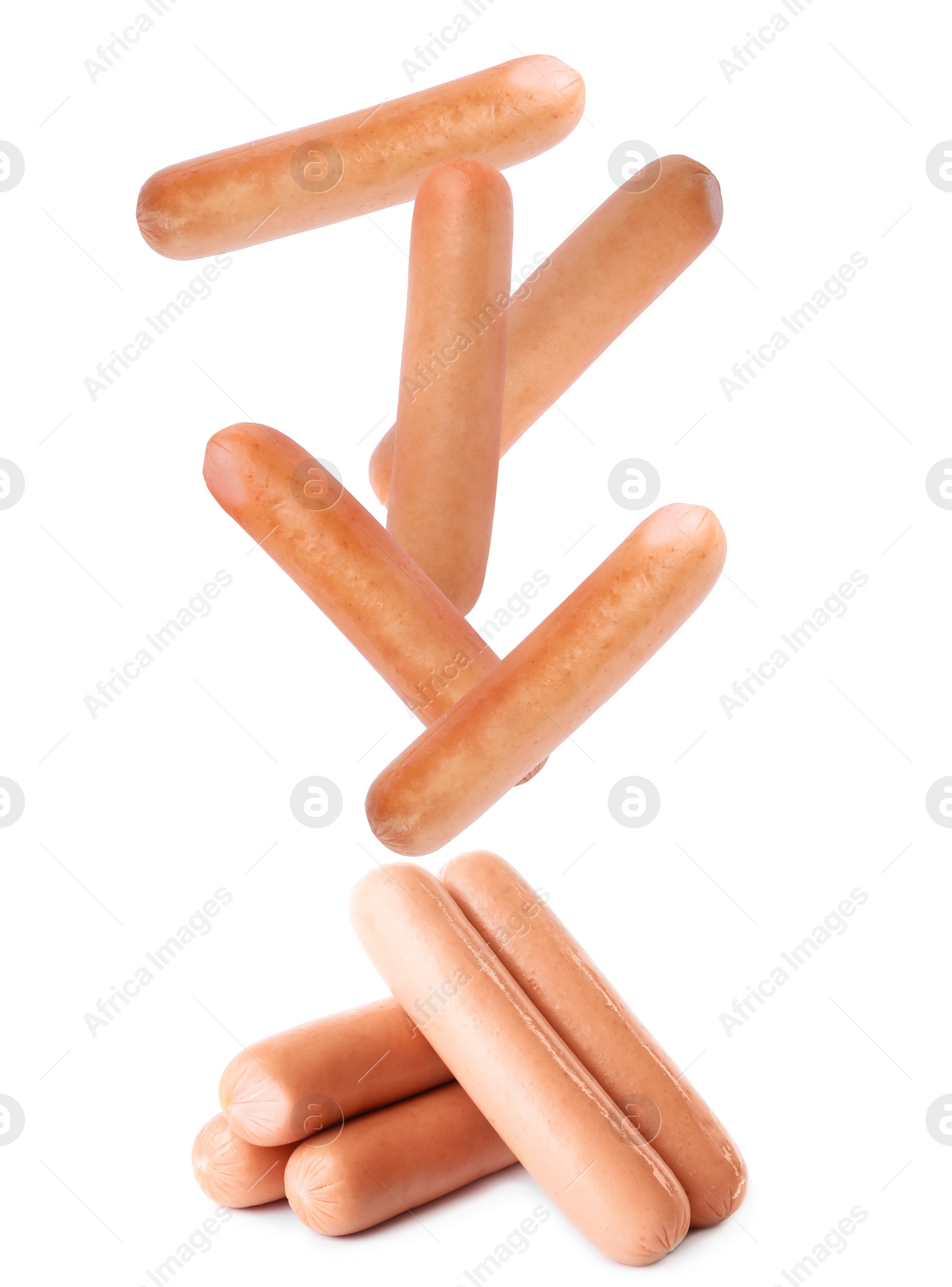 Image of Set of flying fresh sausages on white background