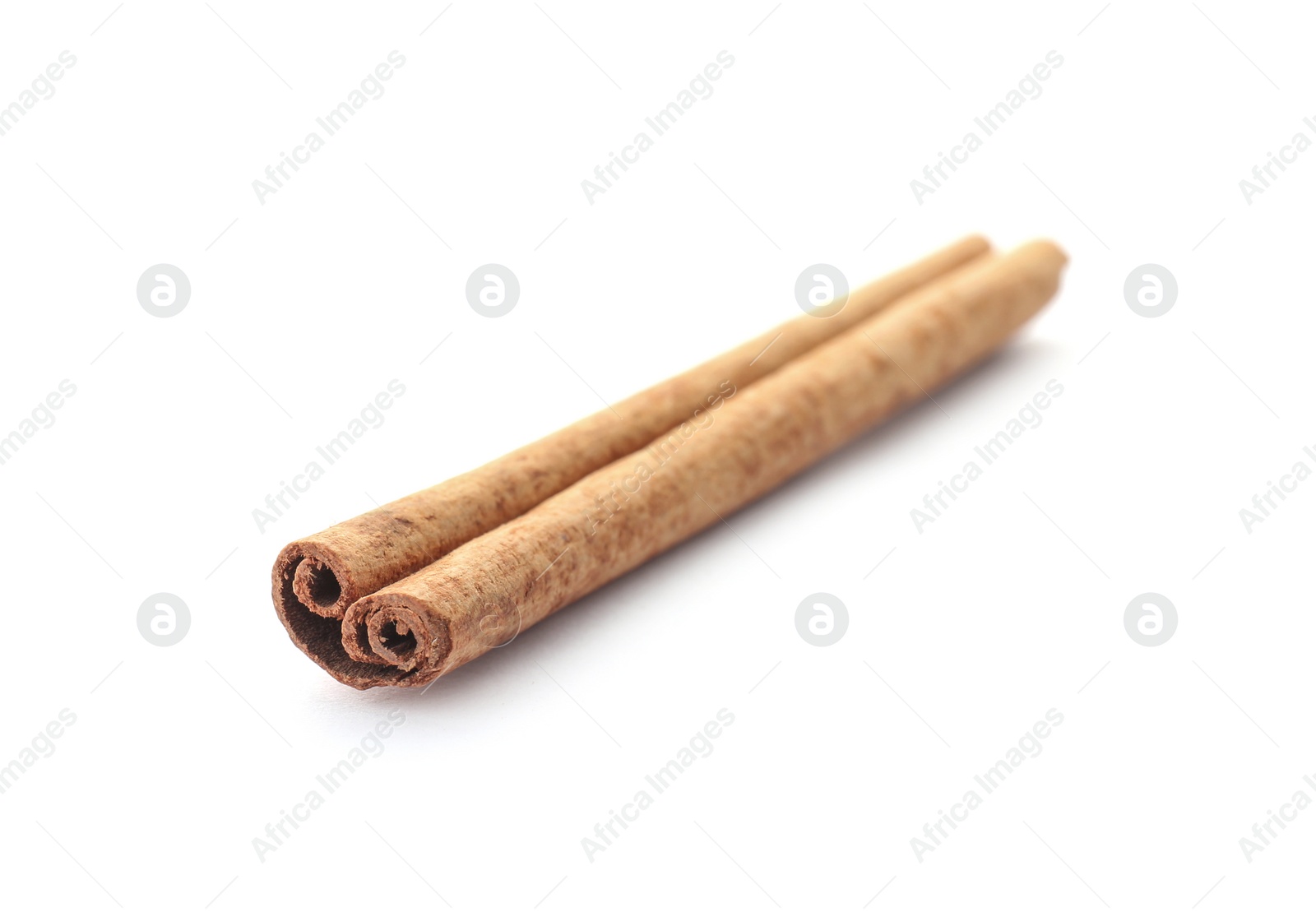 Photo of Aromatic cinnamon stick on white background