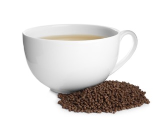 Buckwheat tea and granules on white background