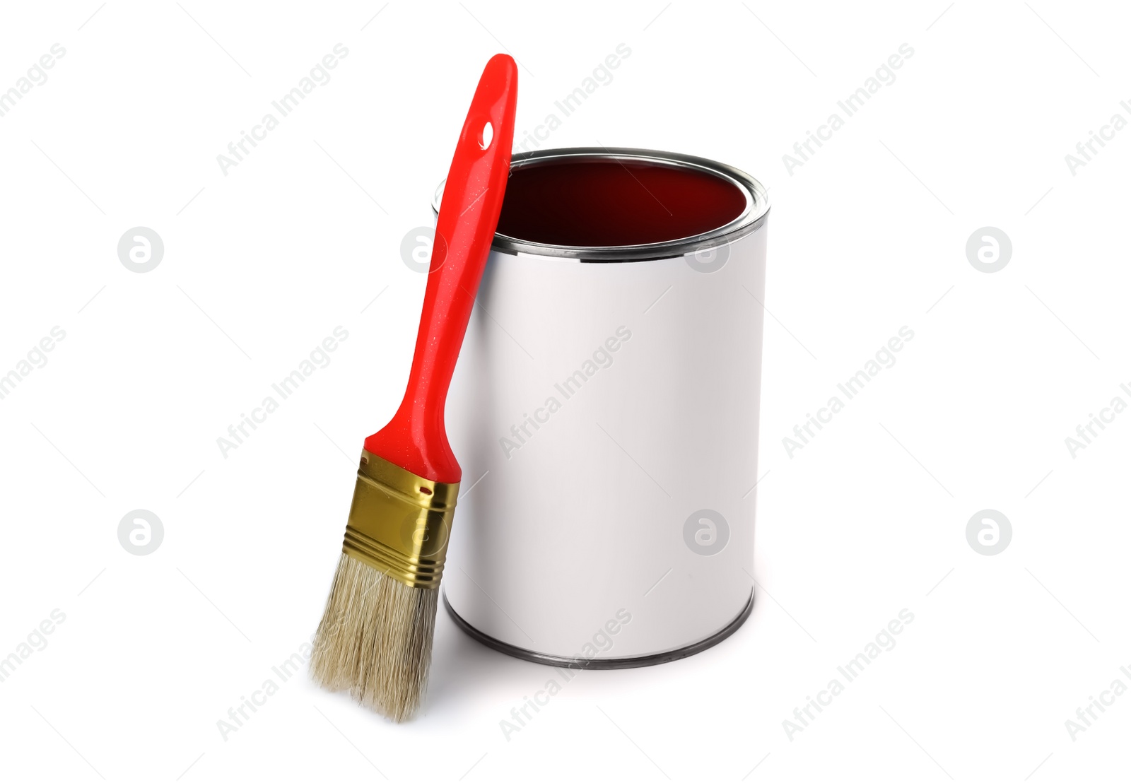 Photo of Paint can and brush on white background