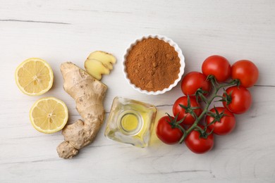 Different fresh ingredients for marinade on white wooden table, flat lay