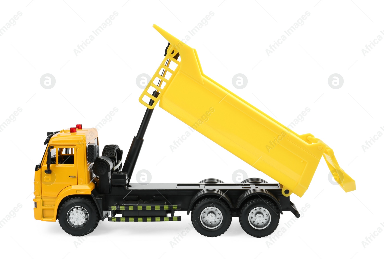 Photo of Yellow truck isolated on white. Children's toy