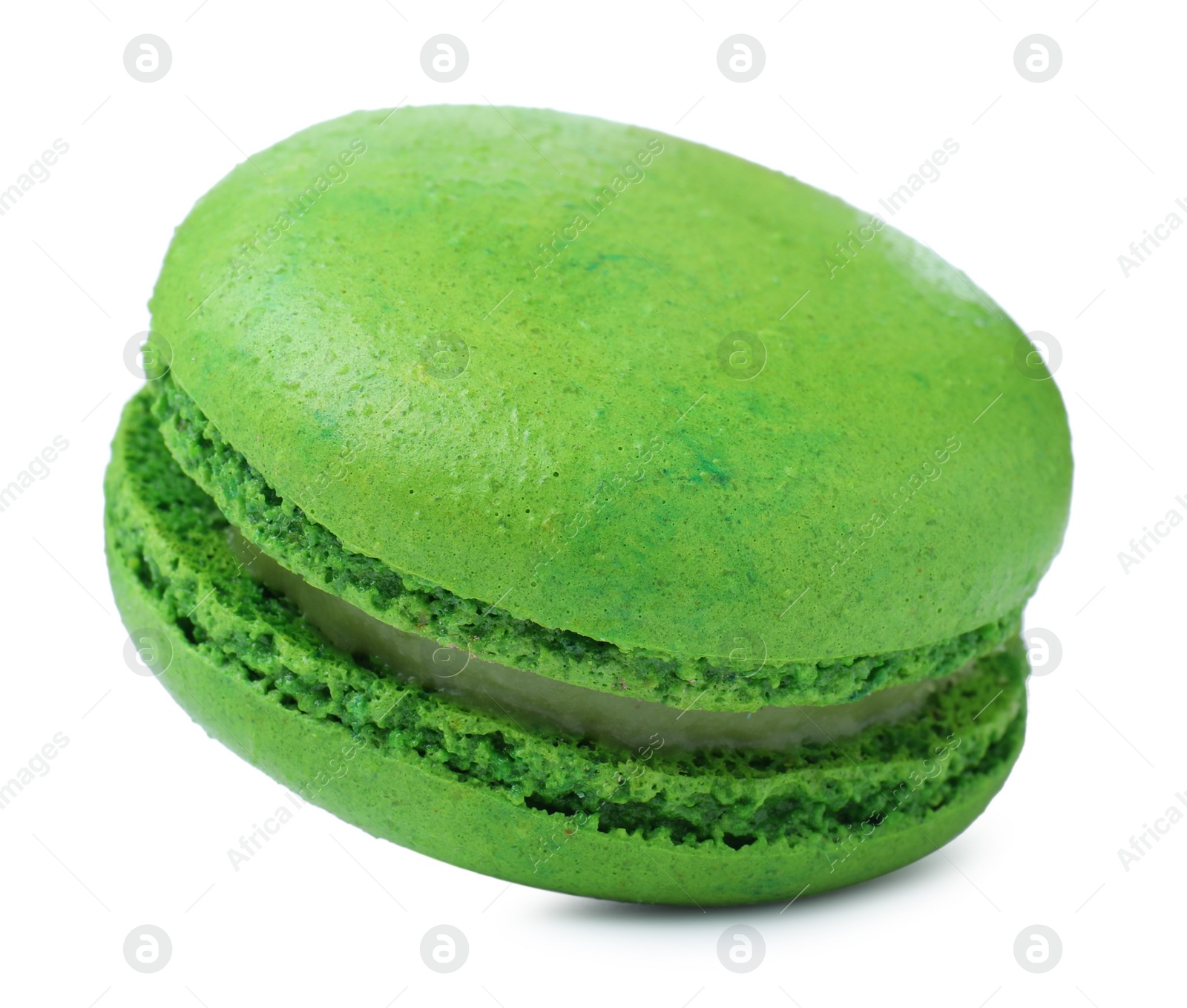 Photo of Green macaron isolated on white. Delicious dessert