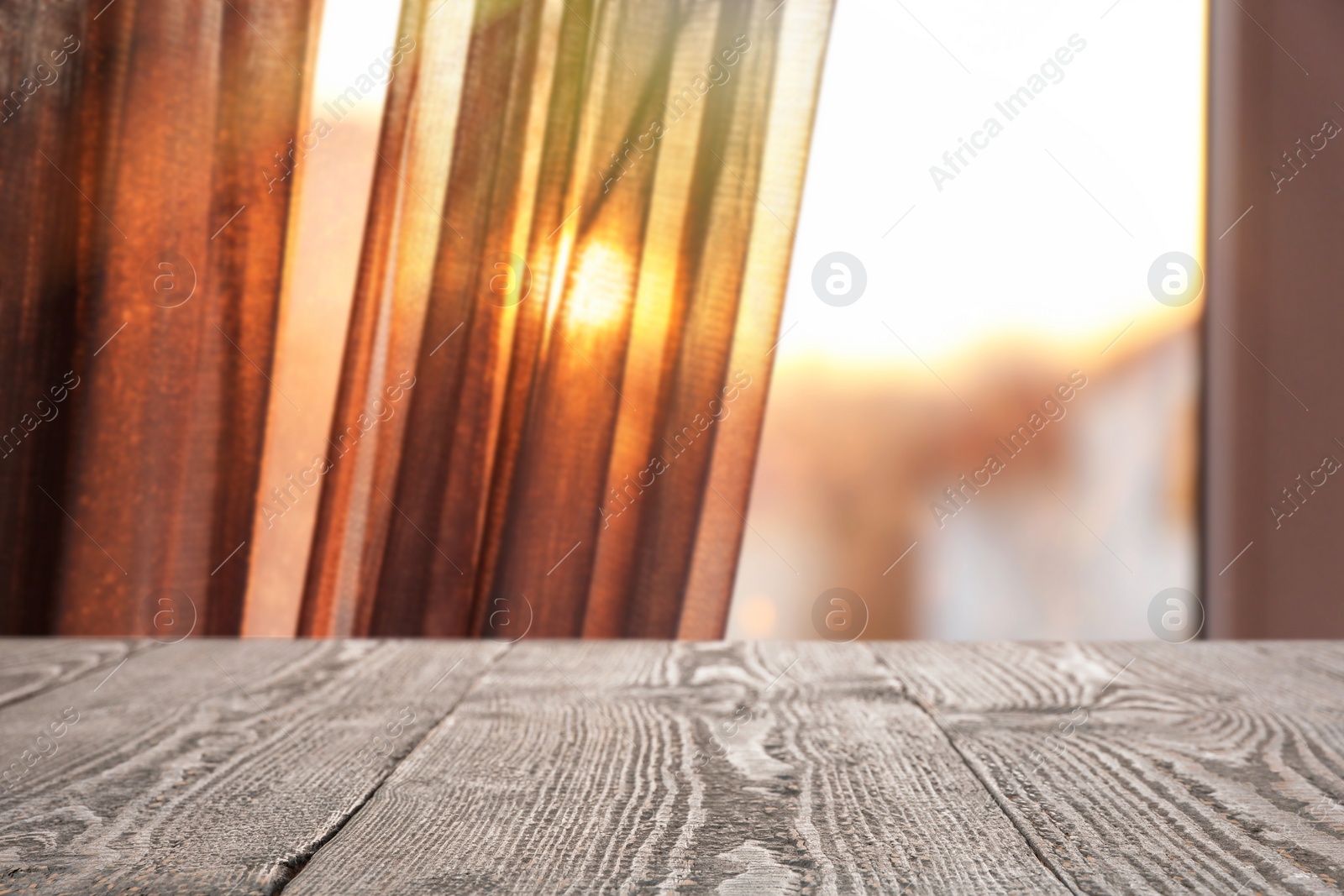 Image of Empty wooden table in room. Space for design