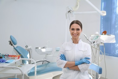 Photo of Portrait of professional dentist at workplace in clinic