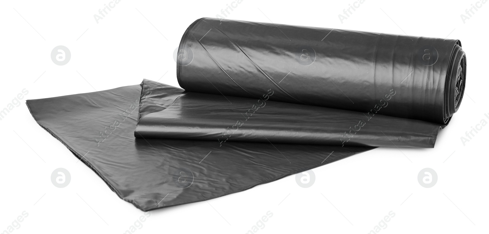 Photo of Roll of black garbage bags isolated on white