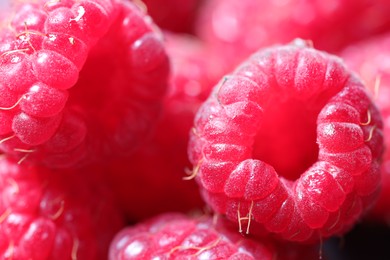 Photo of Tasty fresh ripe raspberries as background, macro view