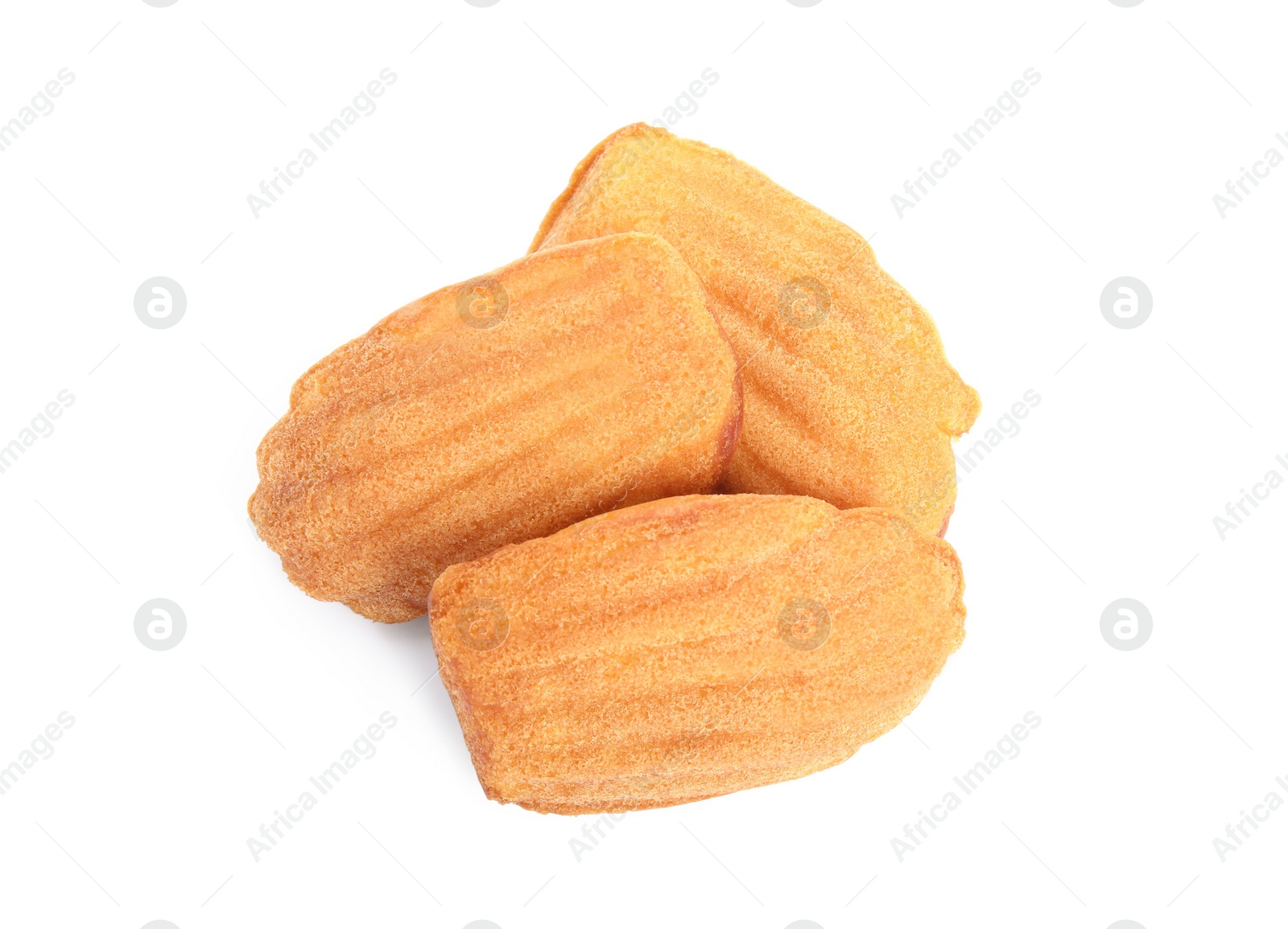 Photo of Delicious madeleine cakes on white background, top view