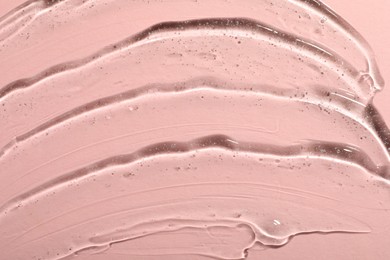 Photo of Cosmetic gel on pink background, top view