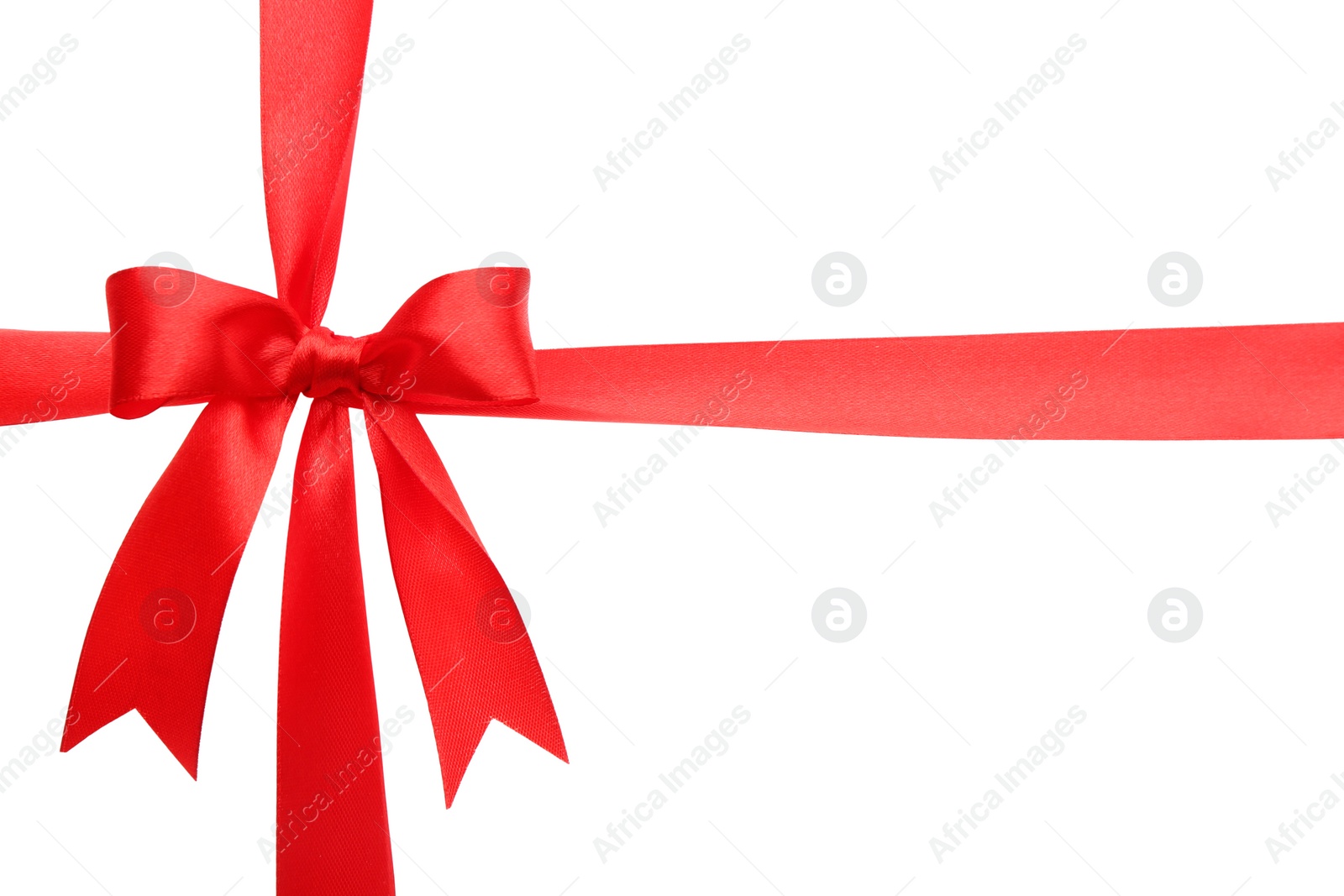 Photo of Red ribbon with bow on white background. Decoration for gift box