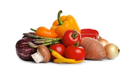 Different fresh ripe vegetables on white background