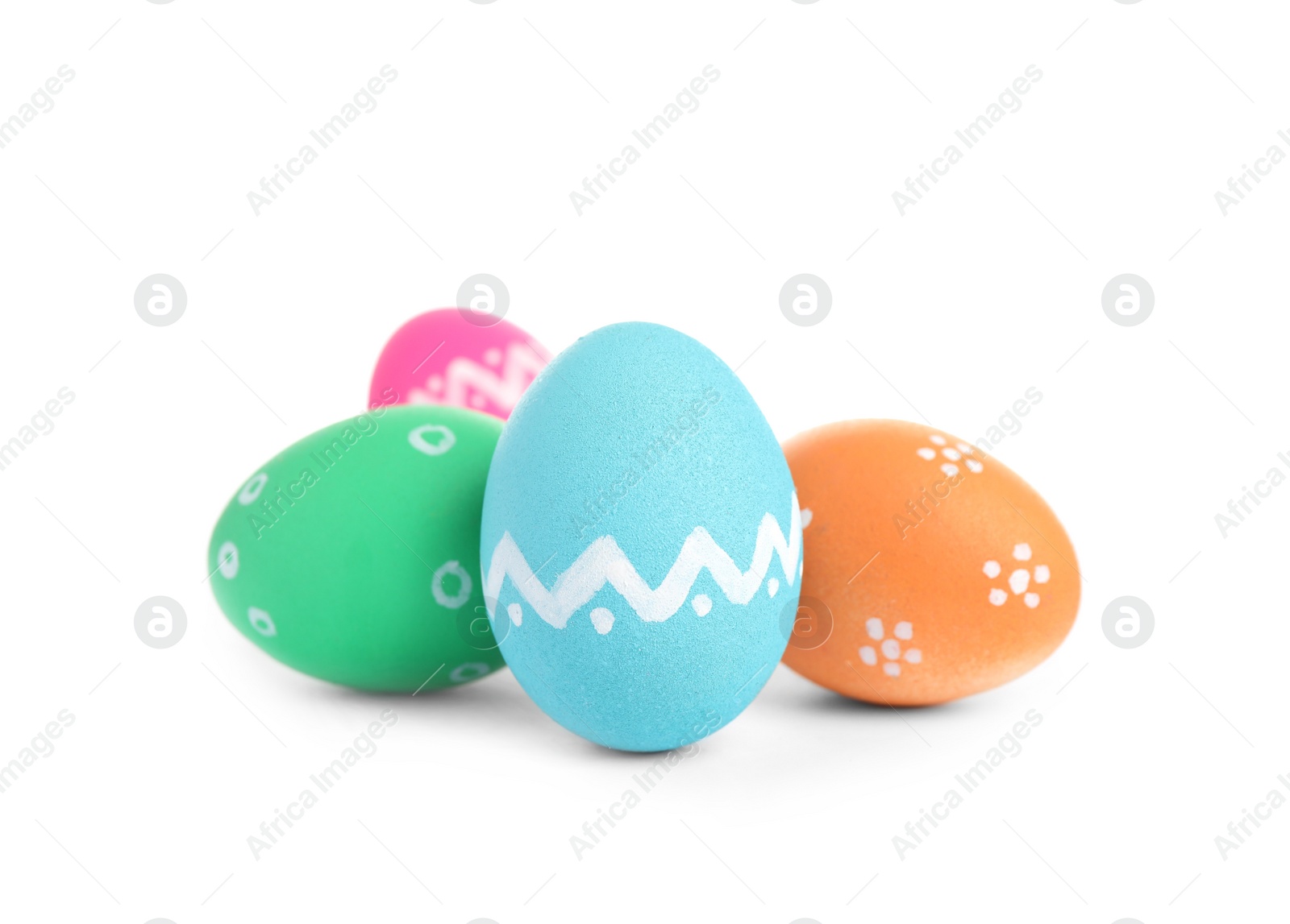 Photo of Colorful Easter eggs with different patterns isolated on white