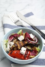 Photo of Delicious salad with roasted eggplant, feta cheese and chia seeds served on table