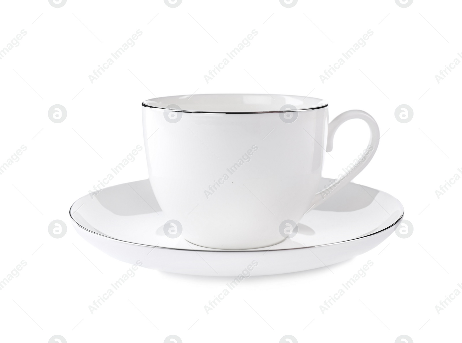 Photo of Teacup with saucer isolated on white. Kitchen tableware