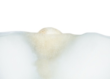 Photo of Bath bomb in water on white background