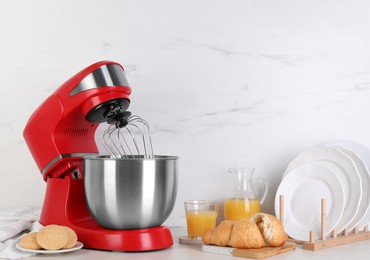 Photo of Composition with modern red stand mixer and different products on white table