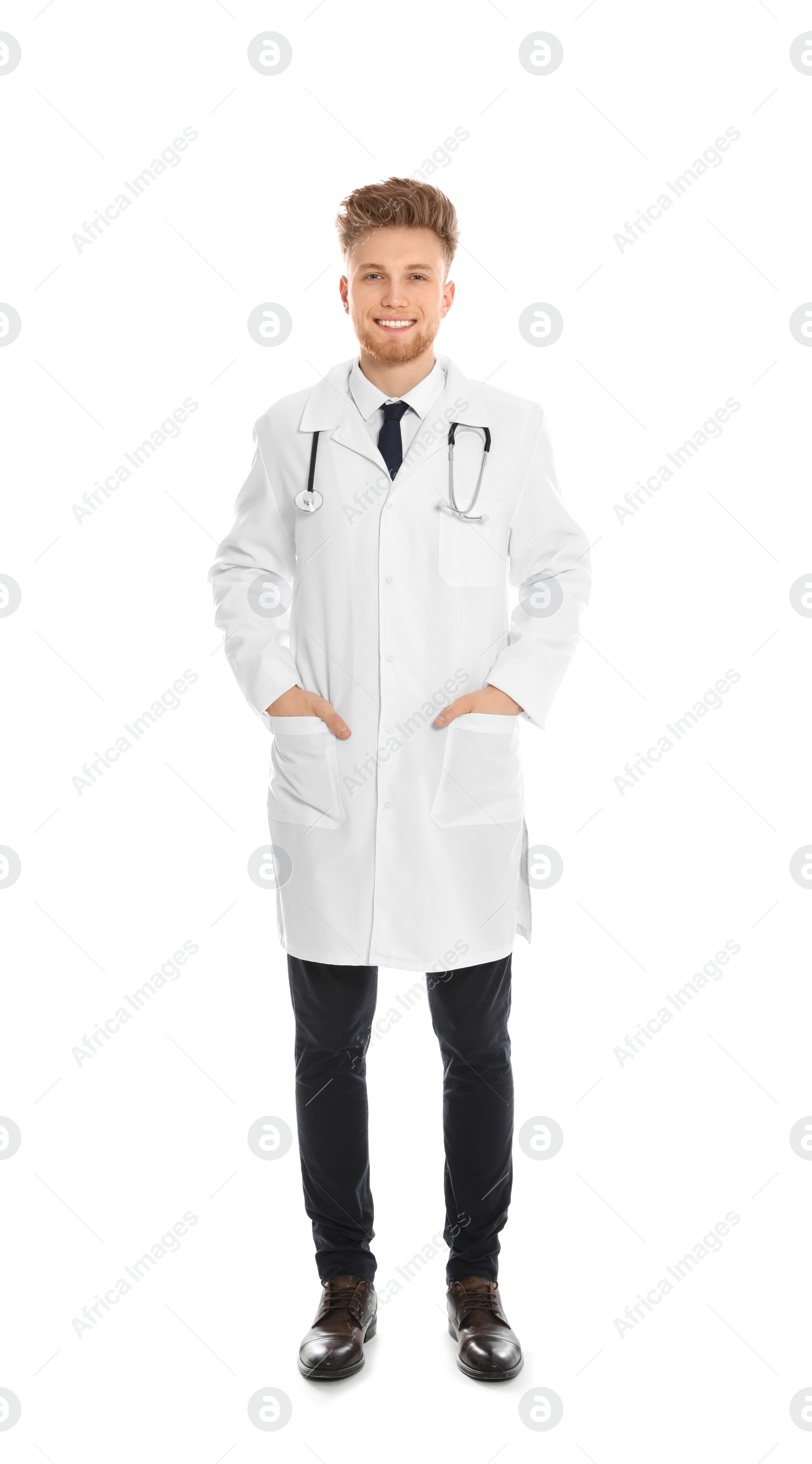 Photo of Full length portrait of medical doctor with stethoscope isolated on white