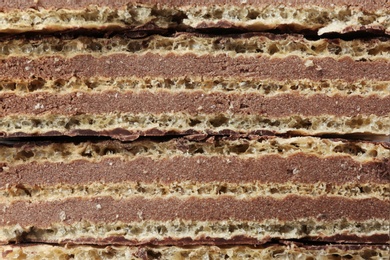 Photo of Closeup view of tasty wafer sticks as background. Sweet food