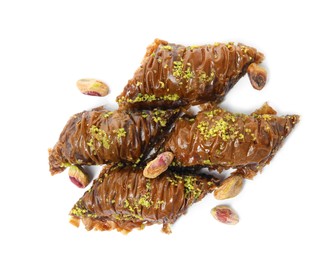 Delicious baklava with pistachio nuts on white background, top view