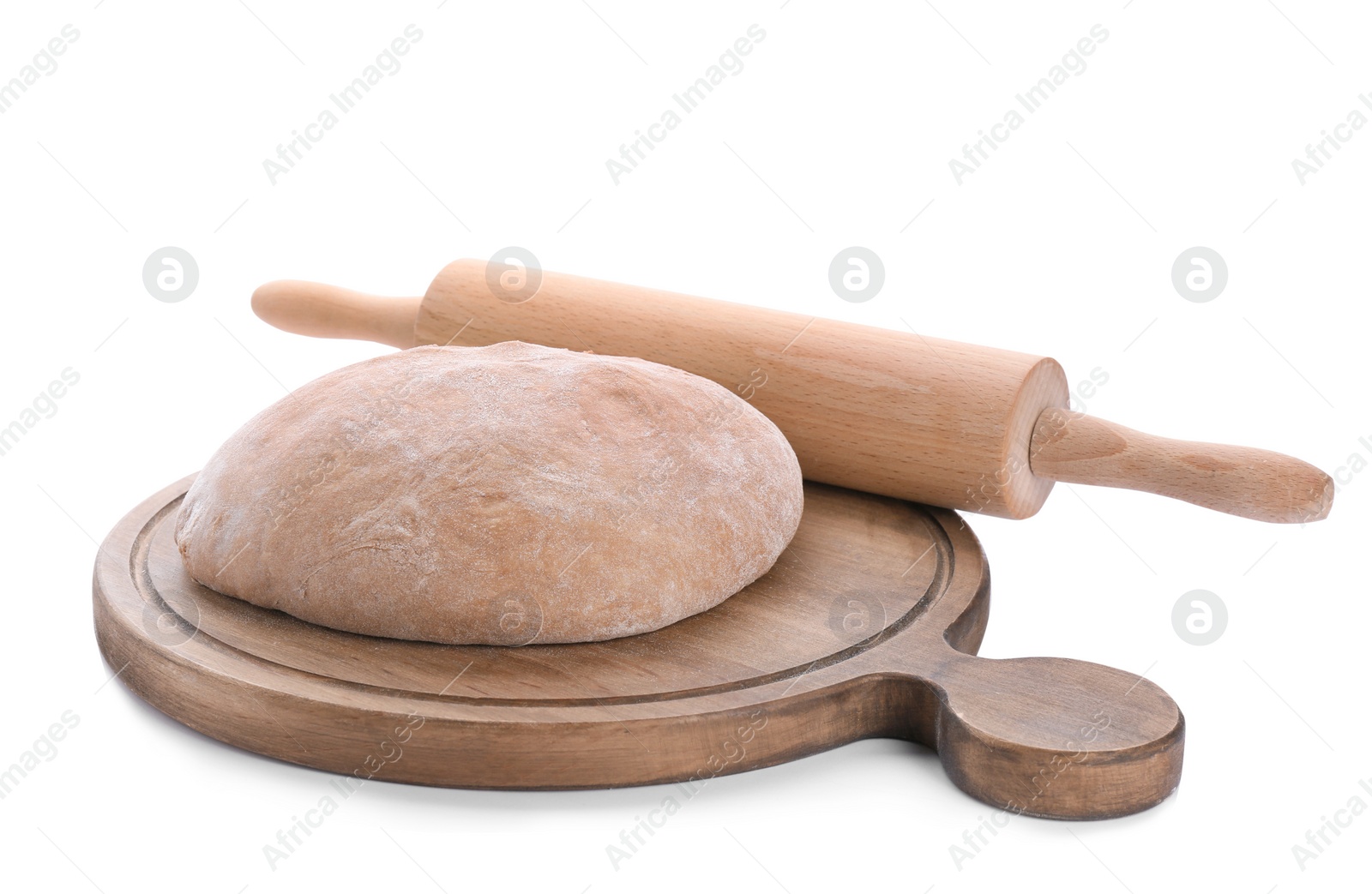 Photo of Wooden board with raw rye dough and rolling pin on white background