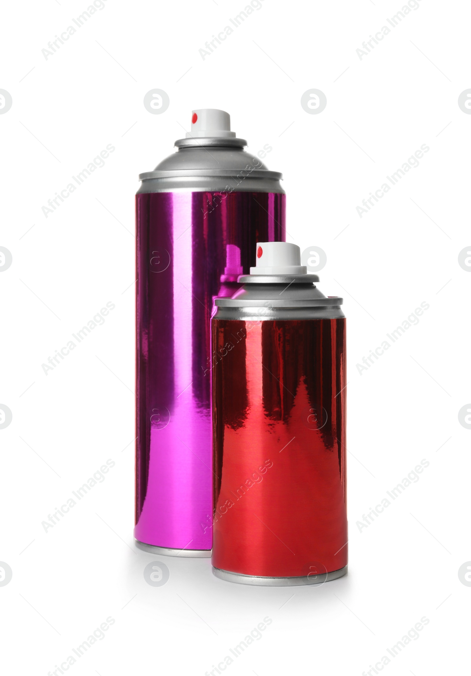 Photo of Different cans of spray paints on white background