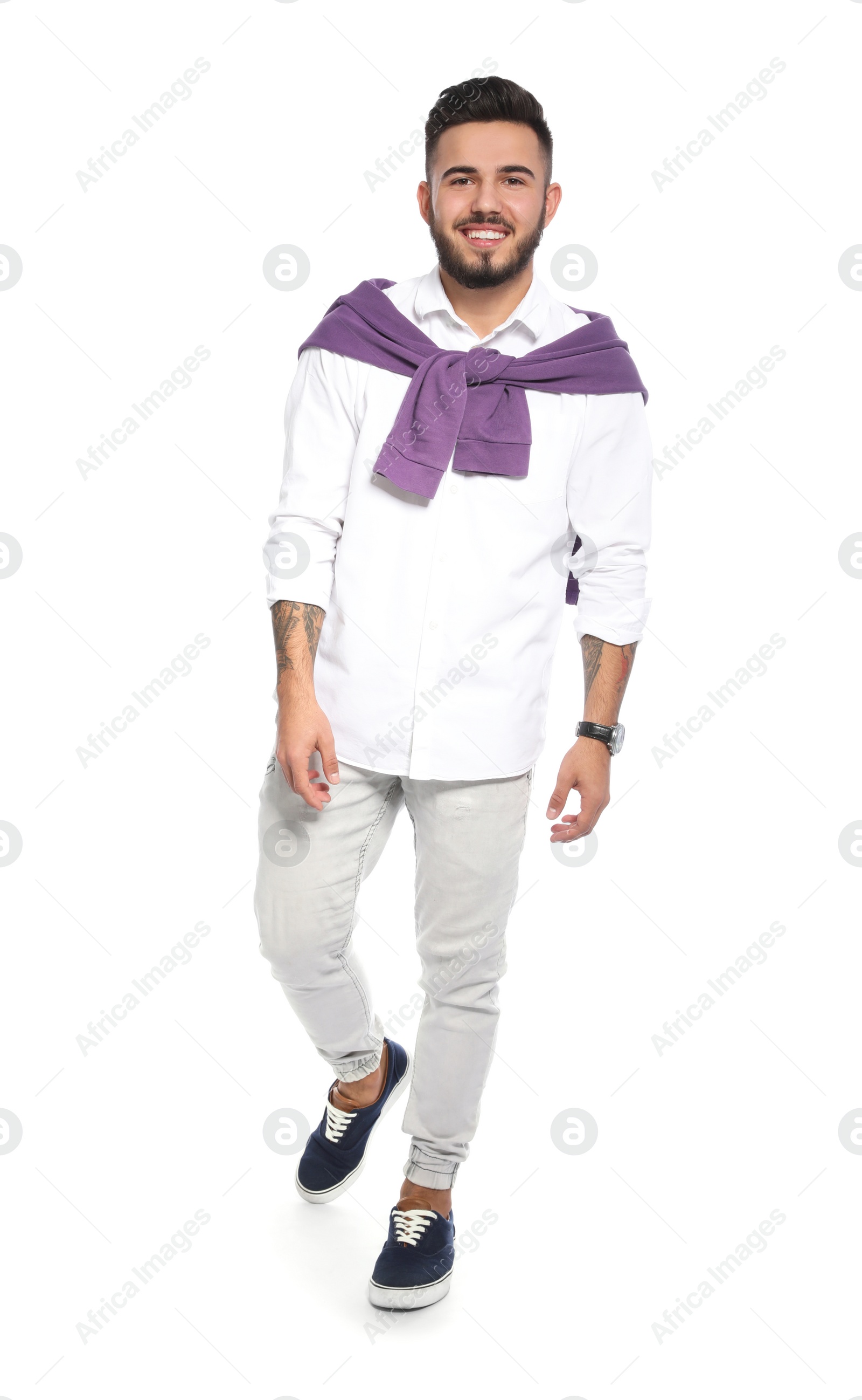 Photo of Portrait of handsome young man on white background