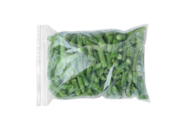 Photo of Plastic bag with frozen green beans on white background, top view. Vegetable preservation