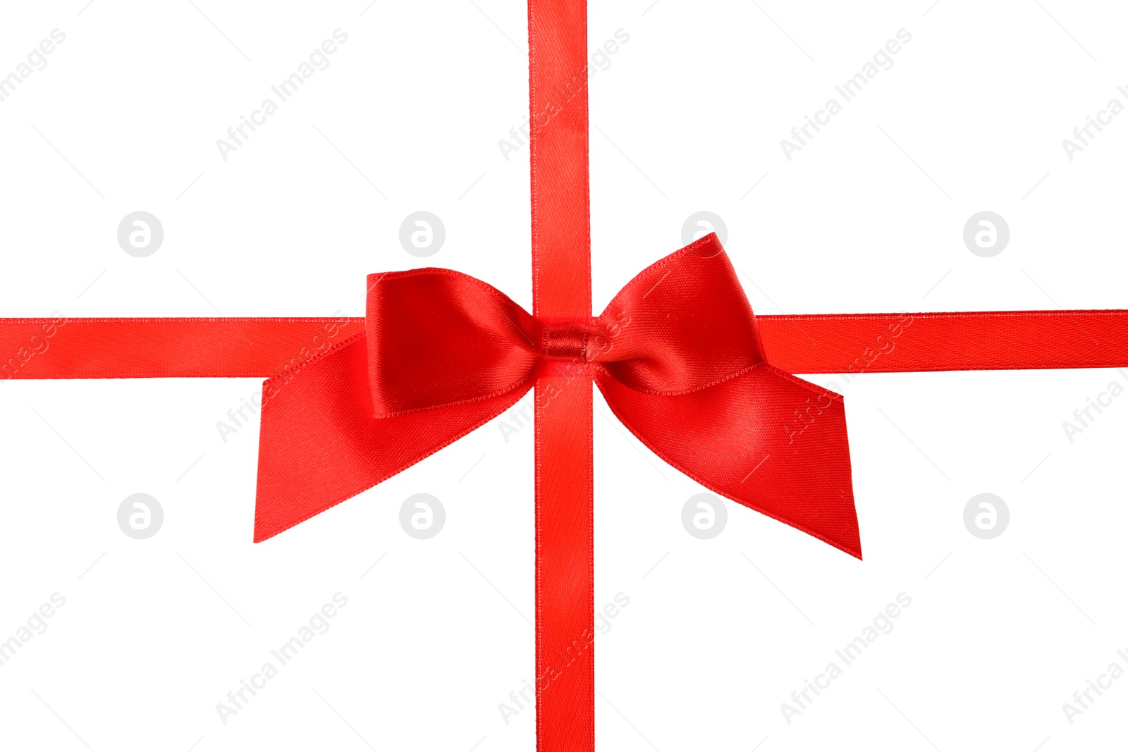 Photo of Red ribbon with bow on white background. Festive decoration