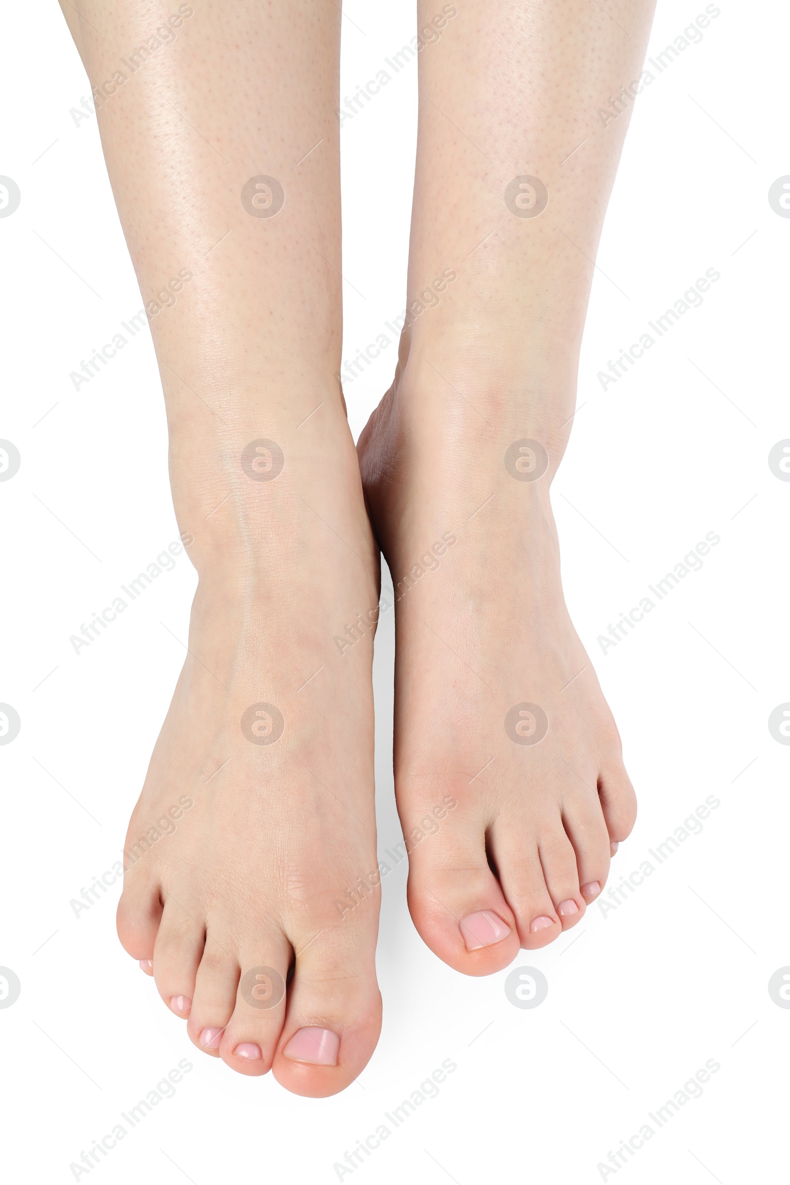 Photo of Woman with neat toenails after pedicure procedure isolated on white, closeup