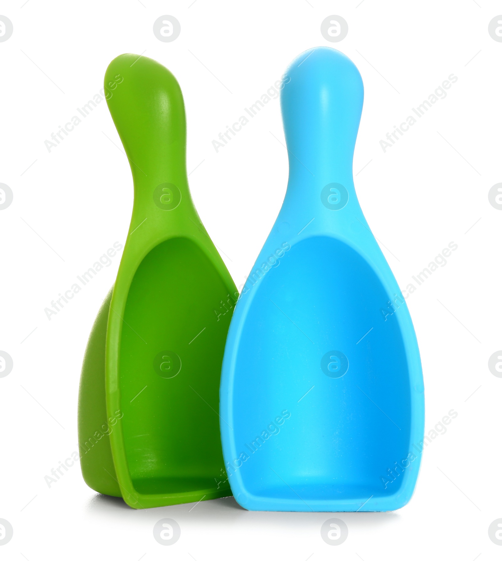 Photo of Plastic scoops on white background. Laundry day